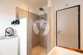 Attraktive Neubauwohnung // 3 Zimmer, EBK, Balkon, Tiefgarage und Außenstellplatz - Bad (2)