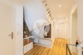 Moderne Neubauwohnung mit Gartenanteil, Carport, Stellplatz und Küche // frei ab Anfang 2027 - Flur