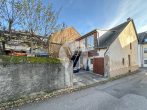 NEUER PREIS // Solides Einfamilienhaus mit grüner Oase im Zentrum von Schweich - Rückansicht